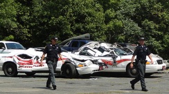 Orleans County Police vehicles and cops cars that freedom fighter Roger Pion of Vermont crushed with his tractor